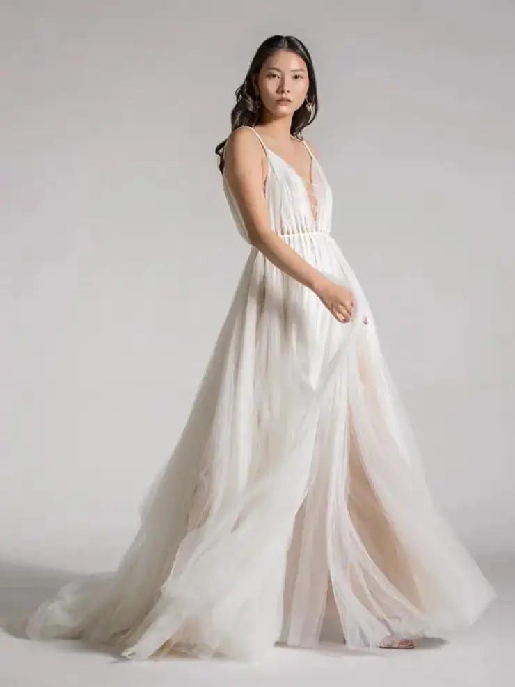 Model wearing a gown by Watters